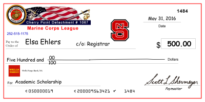image of large-scale mock check presented to previous scholarship recipient, Elsa Ehlers